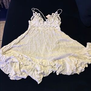 Free People White Chemise with Lace Details and Flowy Design
